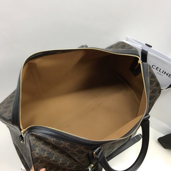 Ce**e large travel bag in triomphe canvas and calfskin