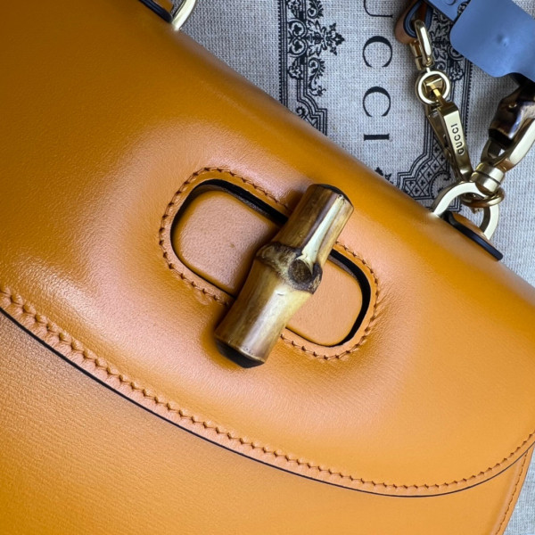 G*u*i small top handle bag with bamboo