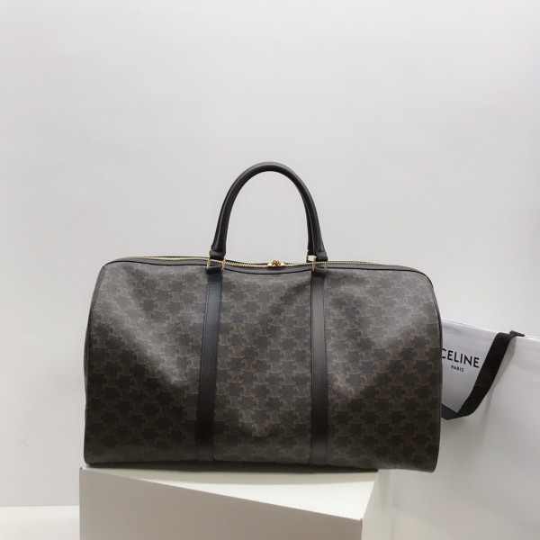 Ce**e large travel bag in triomphe canvas and calfskin