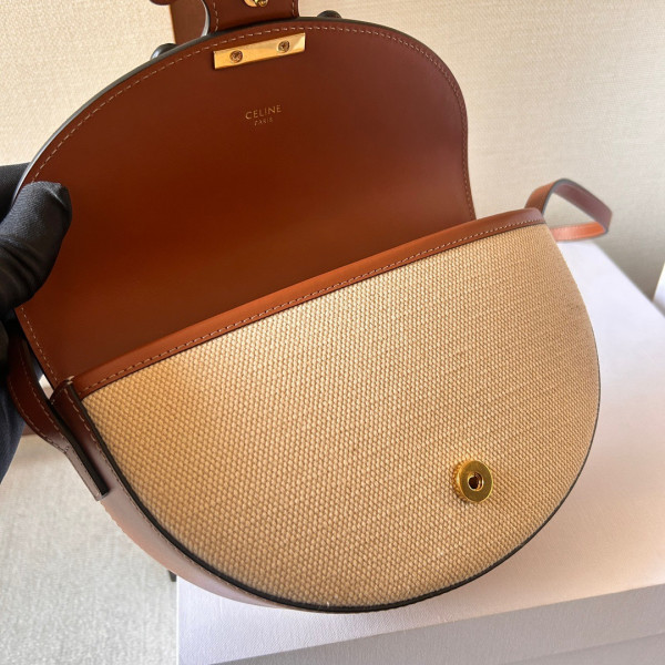 Ce**e besace cuir triomphe