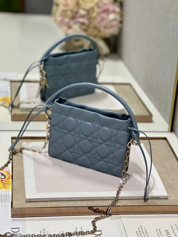 lady D*or top handle drawstring mini bag