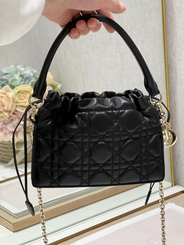 lady D*or top handle drawstring mini bag