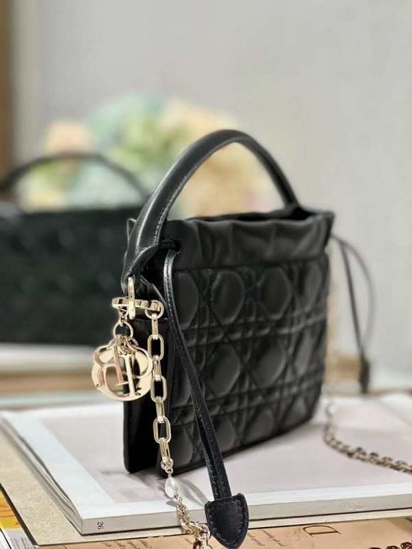 lady D*or top handle drawstring mini bag