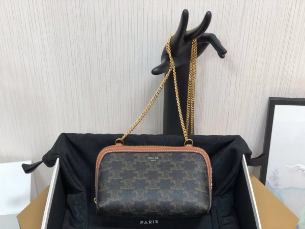 Ce**e clutch on chain in triomphe canvas