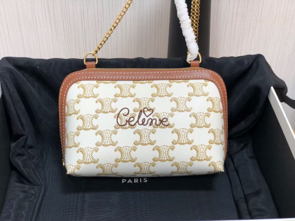 Ce**e clutch on chain in triomphe canvas