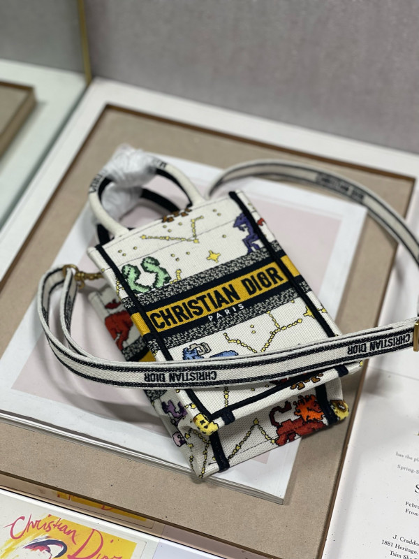 mini D*or book tote phone bag